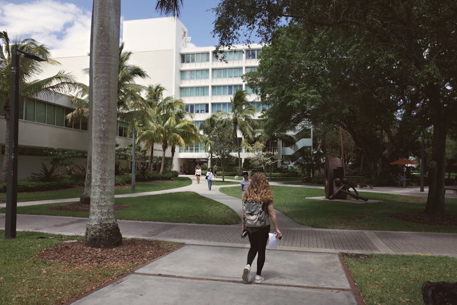 A vibrant university campus scene in Coral Gables, Florida showcasing college life on a sunny day.